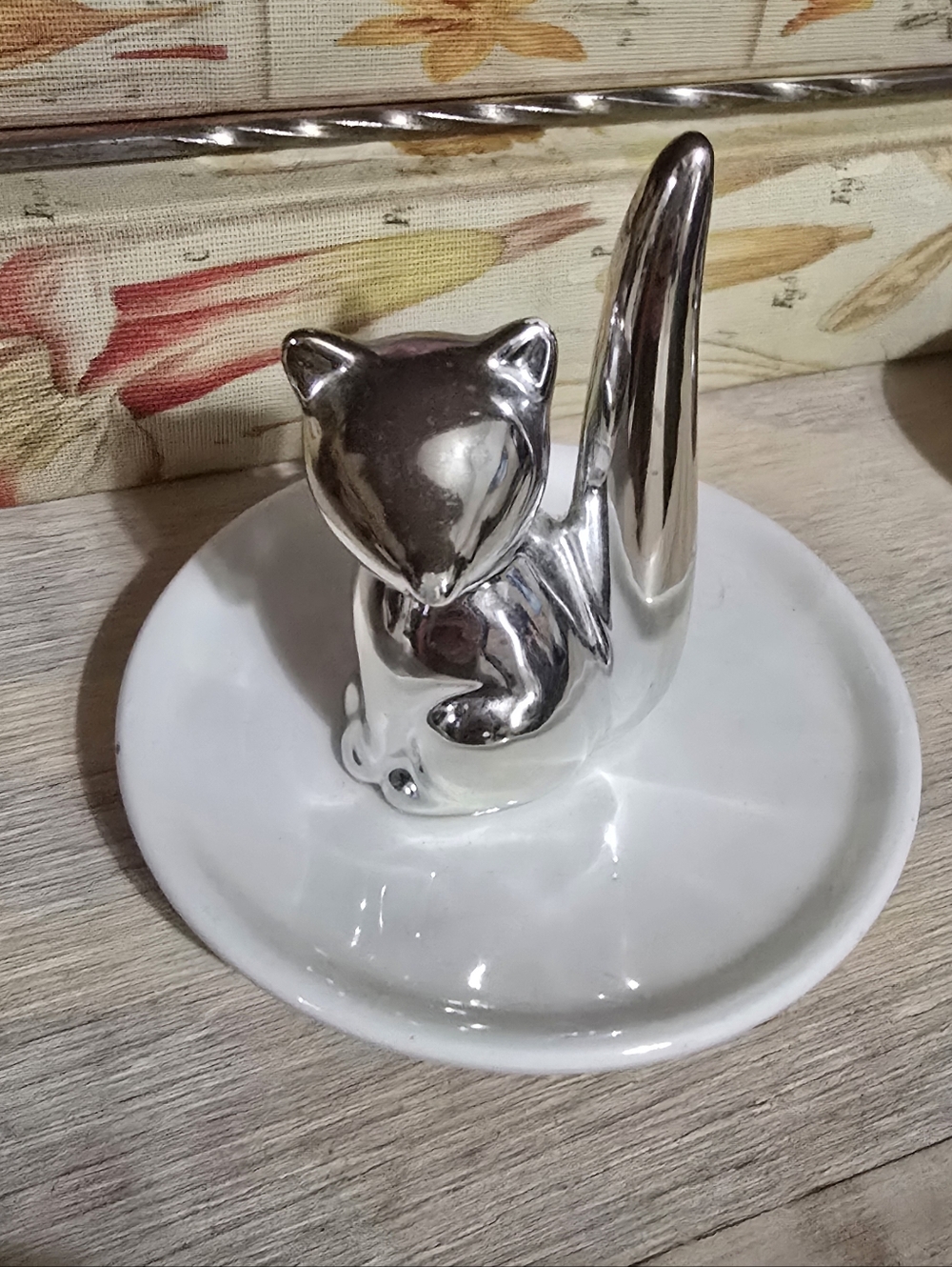 Silver FOX Ring Holder on White Dish